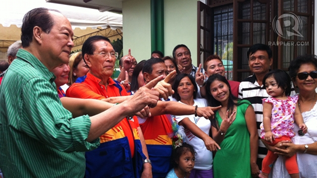 'PRESENCE UNQUANTIFIABLE.' Senate President Juan Ponce Enrile says no form of campaigning beats face to face interaction with voters. Enrile campaigns in Bohol with Vice President Jejomar Binay and former Sen Ernesto Maceda. Photo by Ayee Macaraig 