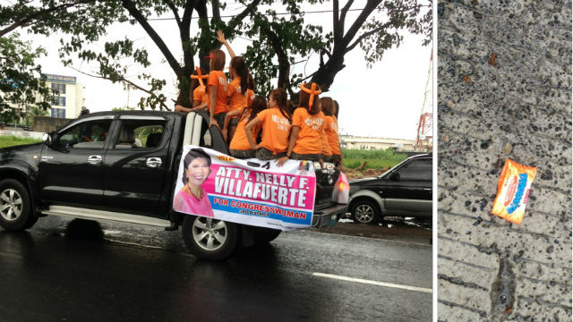 CANDIES. Some Nagauenos cried foul when congressional candidate Nelly Villafuerte's camp threw candies in one of the motorcades. Photo grab from Twitter. 