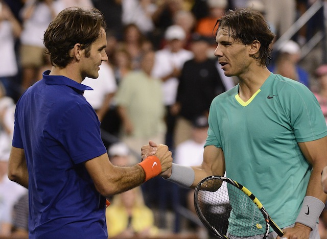 ANOTHER MATCH SOON? Rafael Nadal of Spain (R) shakes hands with Rodger Federer of Switzerland (L) after winning in second set during the BNP Paribas Open tennis tournament in Indian Wells, California, USA, 14 March 2013. EPA/JOHN G. MABANGLO