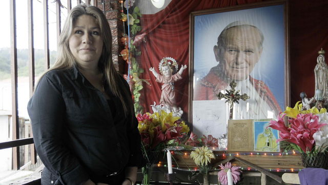MIRACLE. Floribeth Mora listens to the questions of the reporters in front a Pope John Paul II's shrine at her home in Dulce Nombre de Tres Rios, province of Cartago, Costa Rica, 05 July 2013. Photo by EPA/Jeffrey Arguedas