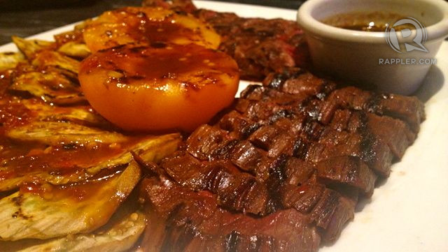 GRILLED ANGUS FLANK STEAK: The medium-rare meat’s flavor blends perfectly with the juicy peaches. The eggplant adds texture and neutralizes the strong, savory flavor.