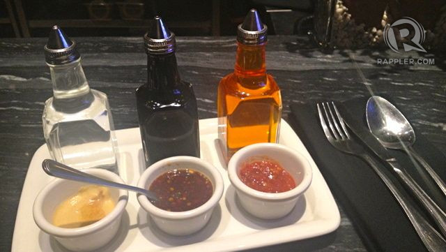 TRIO SAUCE. (In bottles) White vinegar, soy sauce to tone down spiciness and chili oil to increase spiciness. (In sauce dishes) Hot mustard or Chinese wasabi, bay sauce and chili paste.