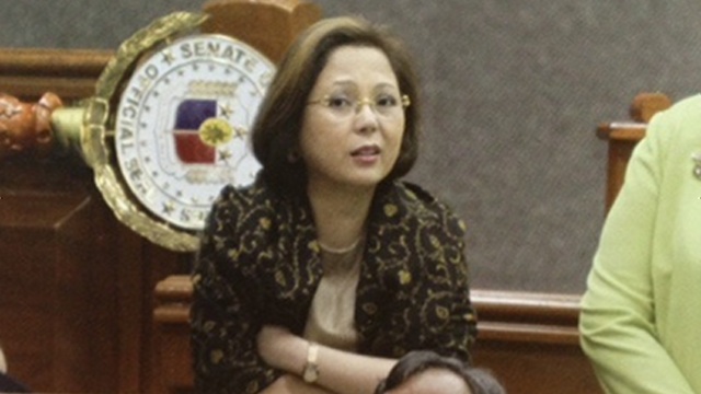 LEAVING FOR GOOD. Enrile's staff said lawyer Gigi Reyes already packed up her things after resigning as the Senate President's chief of staff. File photo of Reyes from the Senate's impeachment book 'The Honor of the Senate.'