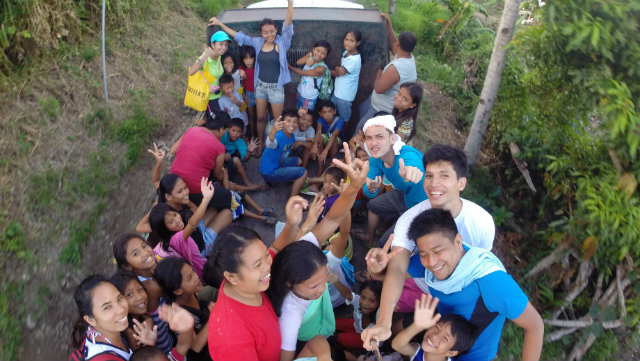 GIVING. Despite needing much more, the locals of the GK Albuera Village act like our presence is enough. Photo by Paul Garcia