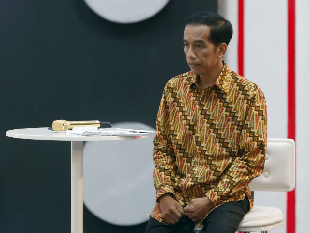 IN DEEP THOUGHT. Indonesian presidential candidate from the Indonesia Democratic Party for Struggle, Joko Widodo, at the third debate among candidates in Jakarta, Indonesia, June 22, 2014.  Photo by Adi Weda/EPA