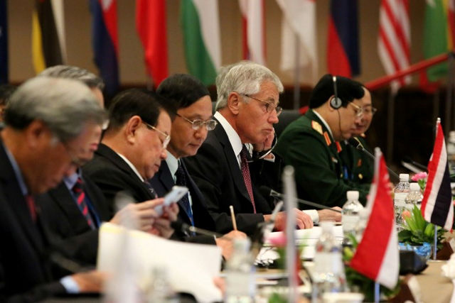 CHUCK HAGEL. US Secretary of Defense Chuck Hagel (5th L-white hair) looks up prior to the start of the Association of Southeast Asian Nations (ASEAN) defense minister's meeting in Jerudong, some 20 km outside Brunei's capital Bandar Seri Begawan on August 29, 2013. AFP/Deen Kassim