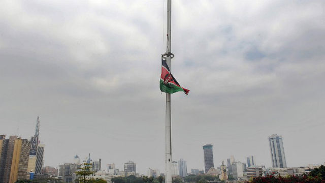 STATE OF MOURNING. A Kenyan flag flies at half-mast over the capital Nairobi on Sept 25, 2013. Photo by Tony Karumba/AFP 