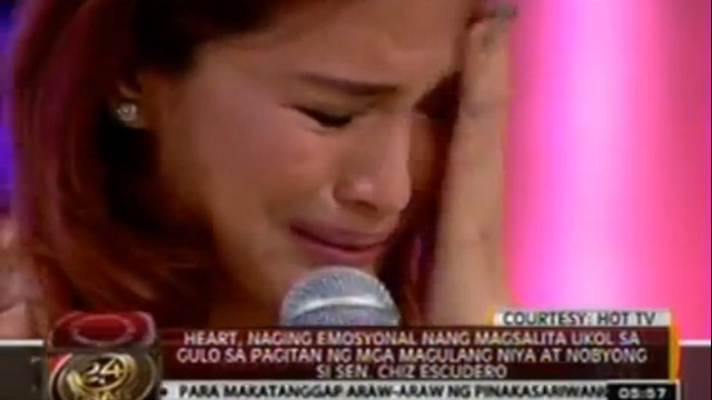 THROUGH TEARS. Heart Evangelista could not help but cry when she was interviewed by GMA about her parents' fight with her boyfriend Sen. Chiz Escudero. Screen grab from YouTube (gmanews)
