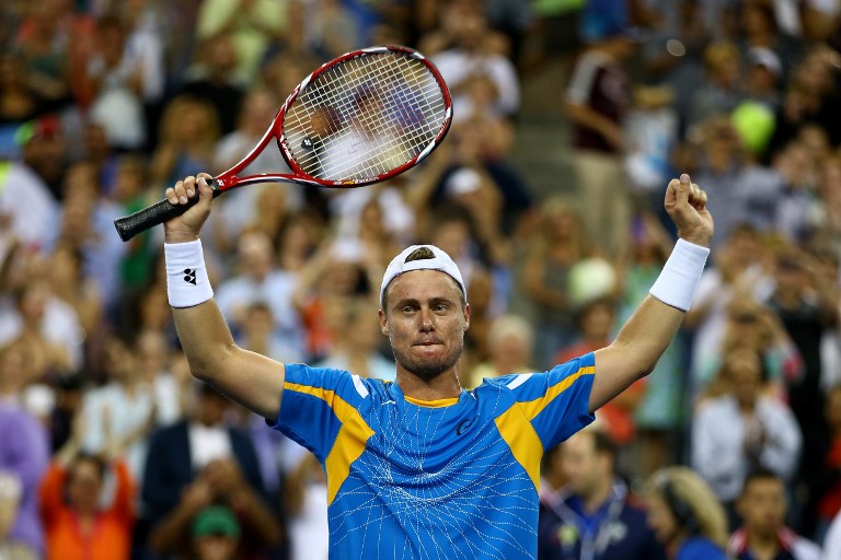 Lleyton Hewitt celebrates match point against Juan Martin Del Potro during their round match on Day Five of the 2013 US Open at USTA Billie Jean King National Tennis Center on August 30, 2013, Queens, New York City. Al Bello/Getty Images/AFP