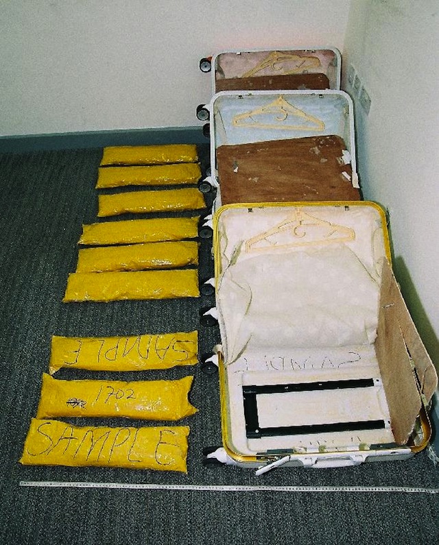 SMUGGLED METH. The suitcases with false compartments and drugs seized in the case. Image courtesy of Hong Kong Customs