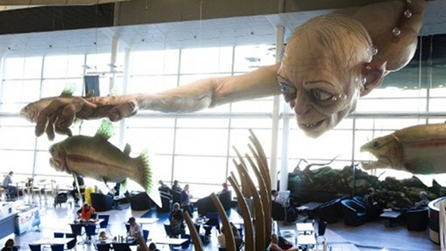 WELCOME. A giant Gollum creature from the "Hobbit" movie catches a fish on the ceiling of Wellington Airport as part of promotions for the upcoming "The Hobbit" movie. Photo by AFP