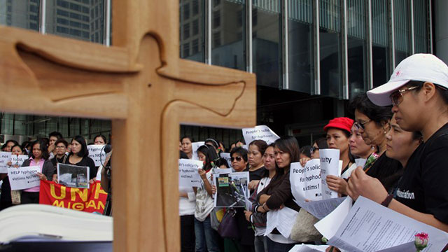 PRAYING FOR PH. People take part in a prayer service for victims of Super Typhoon Yolanda (Haiyan) in Hong Kong on November 17, 2013. Photo by AFP/Richard Sargent