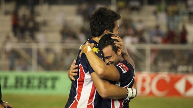 FINALLY. Patrice Olivier and Joe Matthews share a celebratory hug. April 21, 2012. Adrian Portugal.