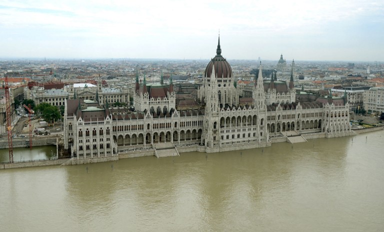 OVERFLOWING. A handout picture of the ORFK (National Police Headquarters) shows an aerial view taken on June 8, 2013 as the stairs of the parliament building are flooded by the Danube in Budapest. Photo by Sandor Szabo/ORFK/AFP
