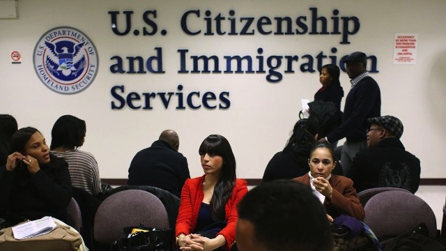 Immigrants wait for their citizenship interviews at the U.S. Citizenship and Immigration Services (USCIS), district office on January 29, 2013 in New York City. John Moore/Getty Images/AFP