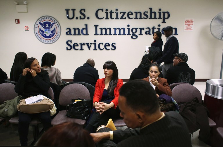Immigrants wait for their citizenship interviews at the U.S. Citizenship and Immigration Services (USCIS), district office on January 29, 2013 in New York City. John Moore/Getty Images/AFP
