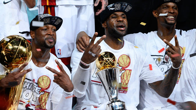 NEW FINALS FORMAT? ESPN reports the NBA is looking to alter its finals format. In this file photo, the Miami Heat celebrate their 2013 Finals win. EPA/Larry Smith