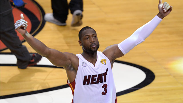 FIRED UP. Wade tries to get the crowd going. Photo by EPA/Rhona Wise.