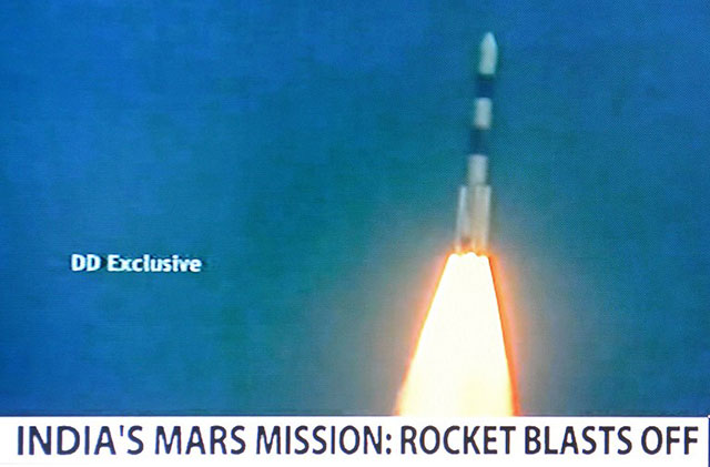 BLAST OFF. This television frame grab taken from Indian television channel NDTV, broadcasting live footage from state television Doordarshan, shows the PSLV-C25 launch vehicle carrying the Mars Orbiter probe as its payload moments after lift-off in Sriharikota on November 5, 2013. Photo by AFP/NDTV/Doordarshan