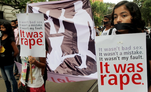 PROTEST VS RAPE. In this file photo, activists attend a silent protest march against a recent rape case in Calcutta, India, 15 June 2013. EPA/Piyal Adhikary