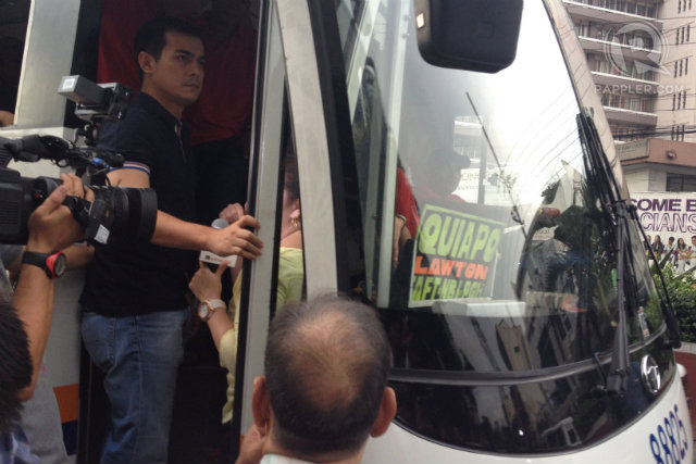 Manila Vice Mayor Isko Moreno boards a bus unauthorized to enter Manila. Eight buses were apprehended by local authorities today, August 8. Photo by Rappler/Bea Cupin