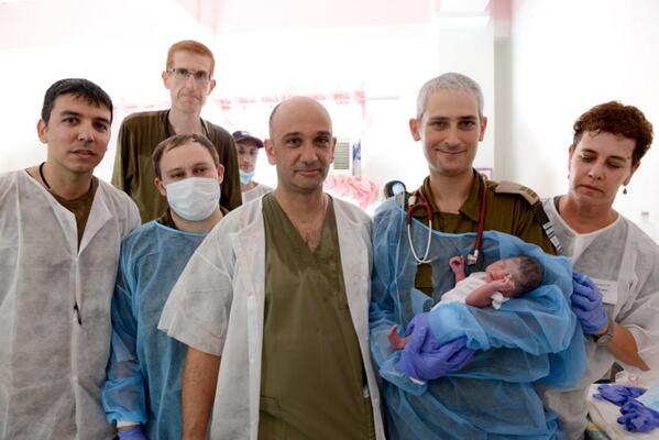 FIRST BABY. Baby boy Israel is born in the Israeli Defense Forces field hospital in Bogo City, Cebu, named after the country that helped her mother give birth. Photo from the Twitter account of IDF Spokesman for International Media Peter Lerner 