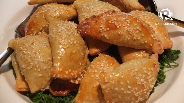 LOOKS FAMILIAR? Bourekitas, filled triangle pastries, look like empanadas