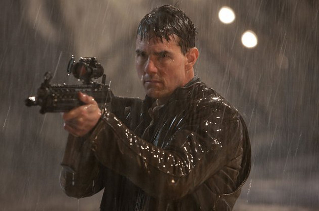 SHOOT, IT’S HIM. Tom Cruise takes dead aim in Jack Reacher