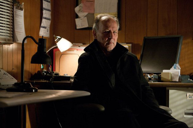 SITTING NOT SO PRETTY. Director Werner Herzog is on camera as a ‘Jack Reacher’ foe