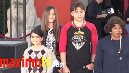BLANKET, PARIS AND PRINCE Michael with their grandmother Katherine at an event for Michael Jackson in January. Screen grab from YouTube