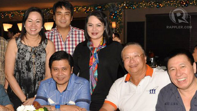 A PARTY. Janet Lim-Napoles, left (standing), rubs elbows with senators Jinggoy Estrada and Bong Revilla in this photo taken during a party in Estrada's favorite hangout in San Juan. The man second from right is businessman Jaime Dichaves, who has owned to the Jose Velarde account initially linked to former President Joseph Estrada.