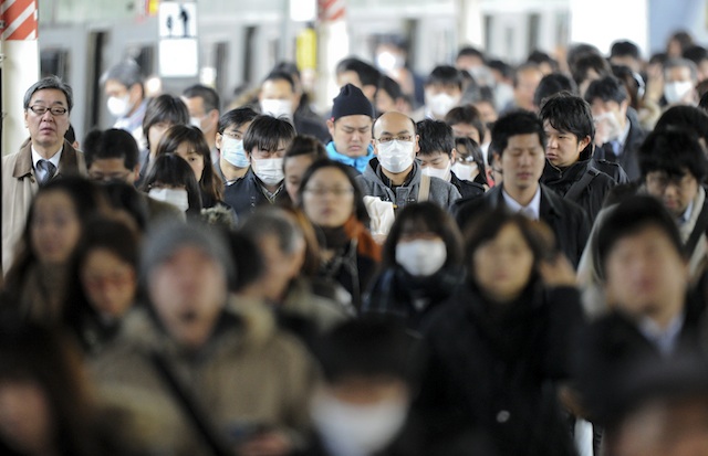 CROWDED. Japanese commuters crowd a station in downtown Tokyo, Japan, 15 March 2011. EPA/Everett Kennedy Brown