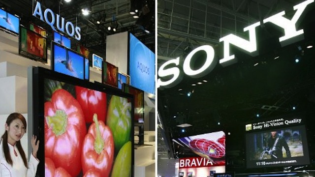 ELECTRONICS GIANTS. This photo shows Sharp's (L) and Sony's large LCD TVs at their booths at a trade show in Chiba. Photo courtesy of AFP