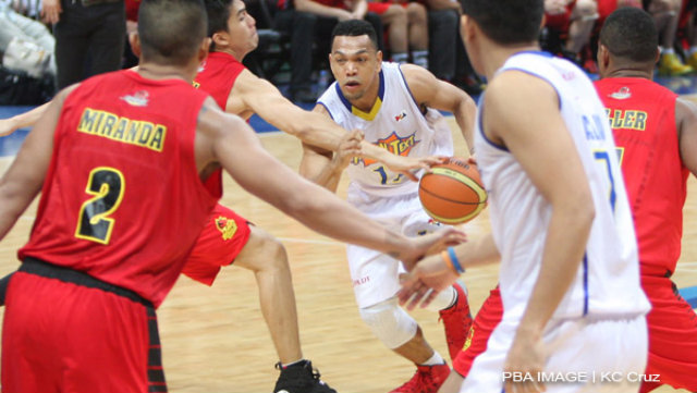 CHAMPIONSHIP POISE. Jayson Castro and the rest of the Talk 'N Text Tropang Texters survive a late surge from Barako Bull. Photo by KC Cruz/PBA Images