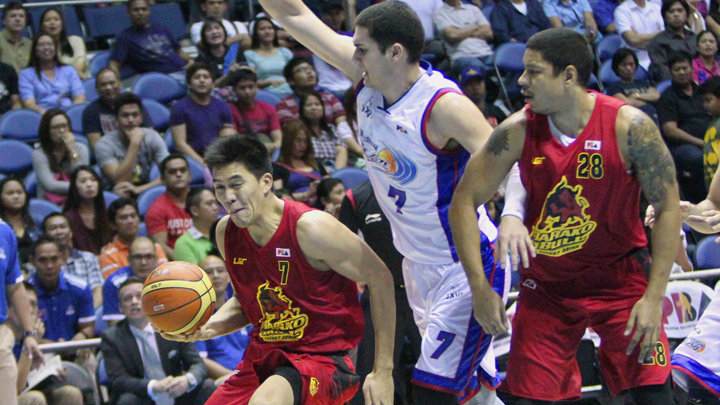 RUNNING OF THE BULL. JC Intal of Barako Bull drives to the hoop. Photo by Nuki Sabio/PBA Images