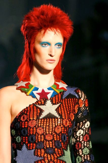 STARSHIPS ARE MADE TO fly on the runway. A model channels David Bowie for Jean-Paul Gaultier. Image from the Vogue Paris Facebook page