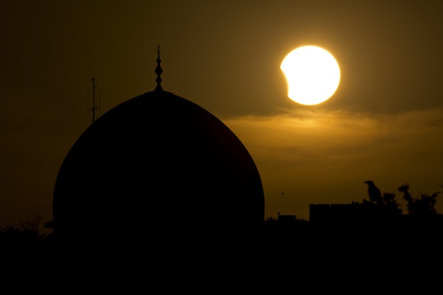 SOLAR ECLIPSE. A partial solar eclipse is seen behind the Haram el-Sharif (the Noble Sanctuary), or the Temple Mount, with the golden Dome of the Rock in the Old City of Jerusalem, Israel, 03 November 2013. EPA/Abir Sultan