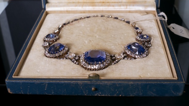 ANTIQUE SAPPHIRE & DIAMOND NECKLACE designed as a graduated line of 5 oval & rectangular-cut sapphires, each surrounded by mine-cut diamonds, separated by an old mine-cut diamond motif, with detachable alternating sapphire and diamond chain mounted in yellow gold. $180,000-220,000