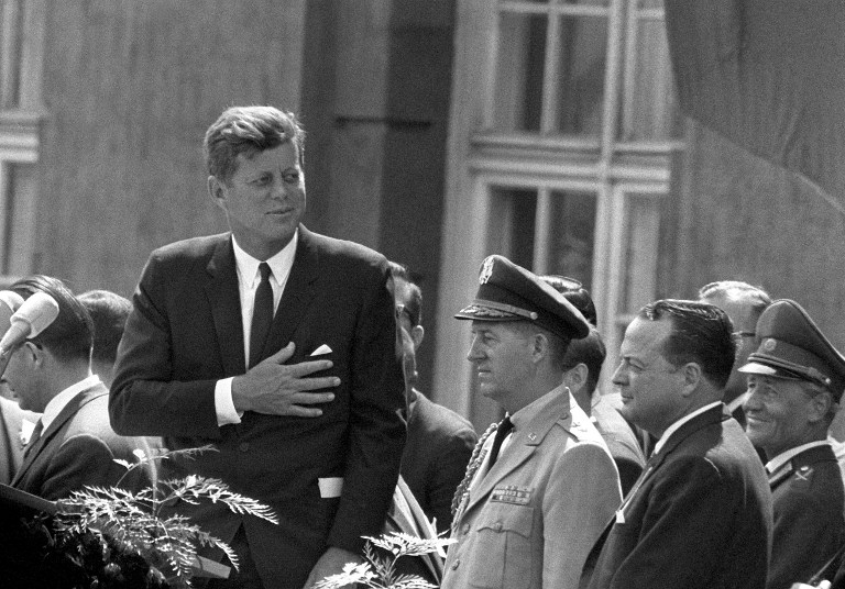 'ICH BIN EIN BERLINER' Picture taken on June 26, 1963 shows then US President John F Kennedy (L) giving a speech at the Schoeneberg city hall in Berlin, where he said his famous German sentence "Ich bin ein Berliner" (I am a Berliner) to underline the support of the United States for West Germany and his empathy for people living in the divided city of Berlin. AFP