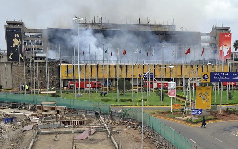 FIRE AFTERMATH. Smoke rises from the Jomo Kenya International Airport in Nairobi on August 7, 2013. Photo by AFP / Simon Maina