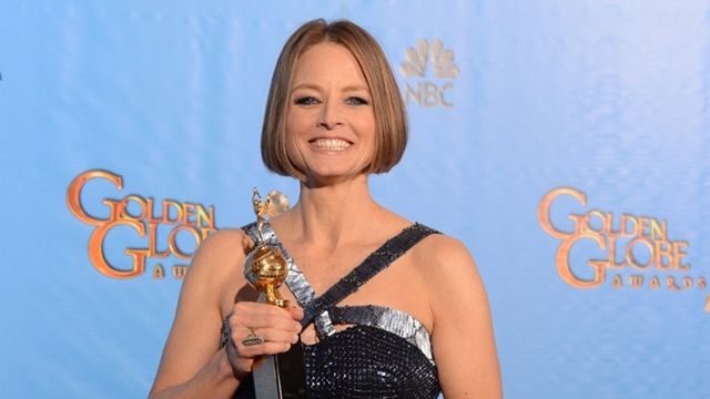 BIG SPEECH. Actress Jodie Foster poses in the press room with her Cecil B. DeMille award after delivering a coming out speech at the Golden Globes awards ceremony in Beverly Hills on January 13, 2013. AFP PHOTO/Robyn BECK
