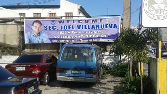 DEFYING POLICY. Technical Education and Skills Development Authority director general Joel Villanueva's face was spotted on a poster in Angeles City. Photo from philboxing.com.