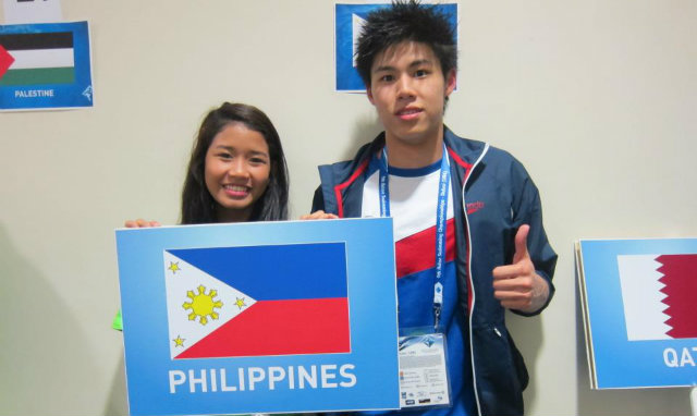 Johan Aguilar (R) poses at the 9th Asian Swimming Championships in Dubai, where he finished 7th. Photo courtesy Aguilar family