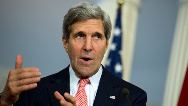 PUSHING THROUGH. US Secretary of State John Kerry arrives in the Philippines on Dec 17. File photo by Nicholas Kamm/AFP 