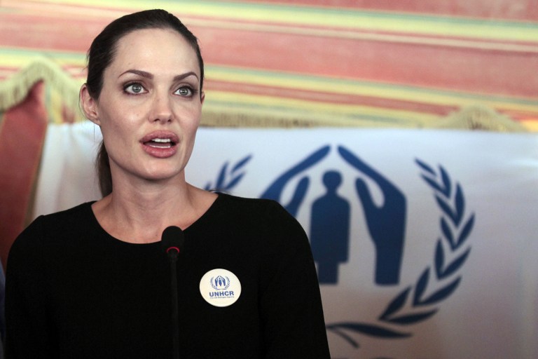 US actress and UNHCR special envoy Angelina Jolie briefs the press during her visit to the Zaatari refugee camp near the Jordnanian border with Syria. AFP PHOTO/ KHALIL MAZRAAWI 