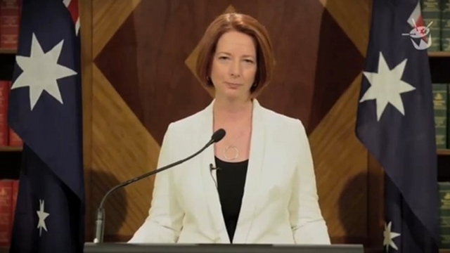 'WORLD ENDING.' Australian Prime Minister Julia Gillard records a spoof video warning about the end of the world due to "Korean pop and flesh-eating zombies." Screenshot from Gillard's video 