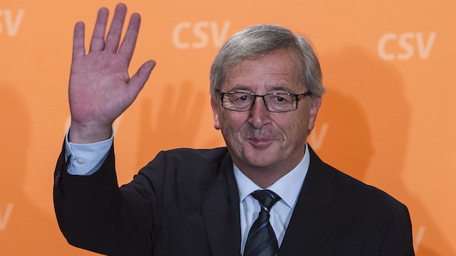 LEADING IN POLLS. Luxembourg's Prime Minister Jean-Claude Juncker waves to supporters at the CSV Party headquarters in Luxembourg City, Luxembourg, 20 October 2013. EPA/Nicolas Bouvy