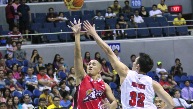 LIVE TO FIGHT ANOTHER DAY. JVee Casio puts up a shot over Keith Jensen of Barako Bull. Photo by Nuki Sabio/PBA Images