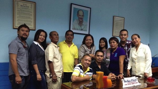 CARETAKER. Akbayan Rep Kaka Bag-ao (standing 5th from left) poses with provincial officials of Dinagat Islands at the office of former Dinagat Rep Ruben Ecleo Jr. Photo from Bag-ao's Twitter account