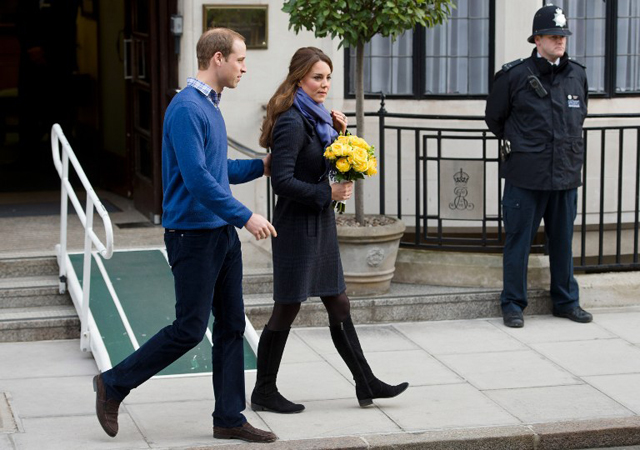 FEELING BETTER. Britain's Prince William, the Duke of Cambridge and his wife Catherine, Duchess of Cambridge, leave the King Edward VII hospital in central London. AFP PHOTO 